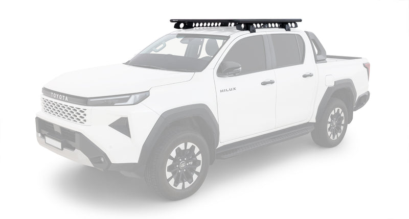 Pioneer 6 non-invasive roof platform – installed Hilux view. Official supplier images show the Gen 9/N90 example. The same kit is also listed for Gen 8/N80 Double Cab. Vehicle and unrelated accessories are not included.