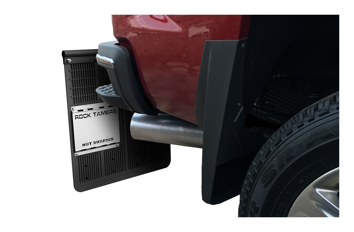 Rock Tamers heat shield installed beside a vehicle exhaust