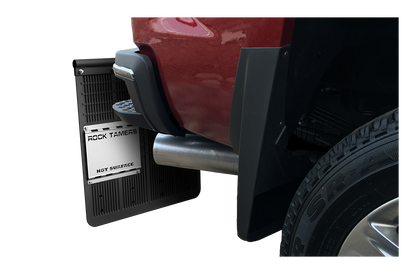 Rock Tamers heat shield installed beside a vehicle exhaust